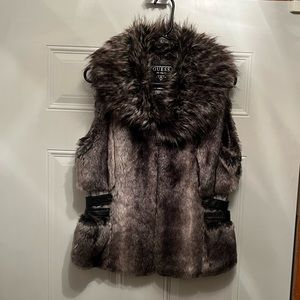Guess Gray and Black faux fur vest with leather trim and buckles.